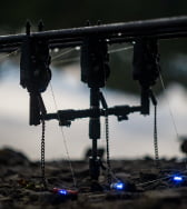 JAG Prolite Black Bank stick with bite alarms attached and lake in background