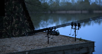 Fishing rods on lake edge