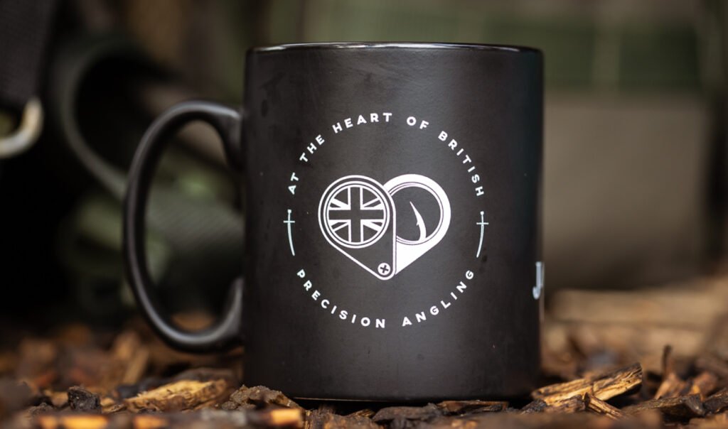 JAG Heart of British mug on bed of leaves